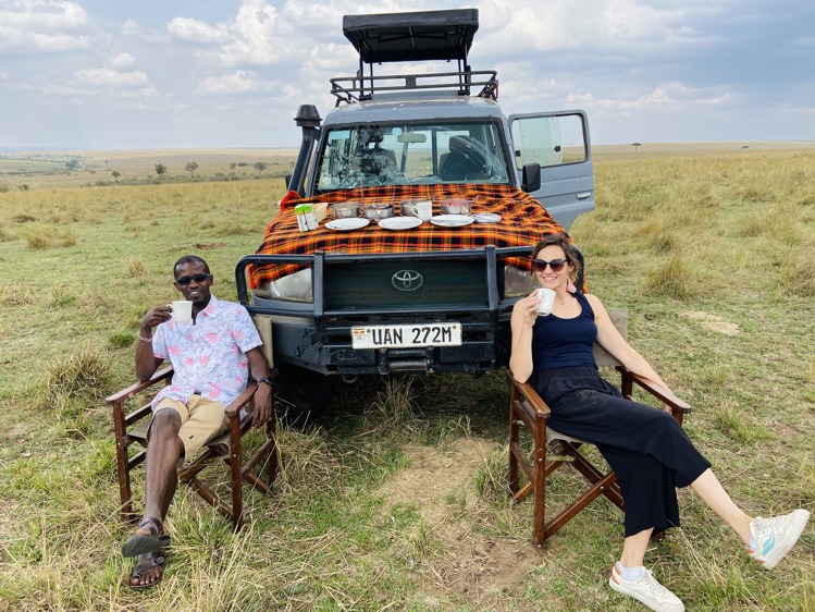 1-week itinerary: man and woman drinking coffee in Kenya in front of car
